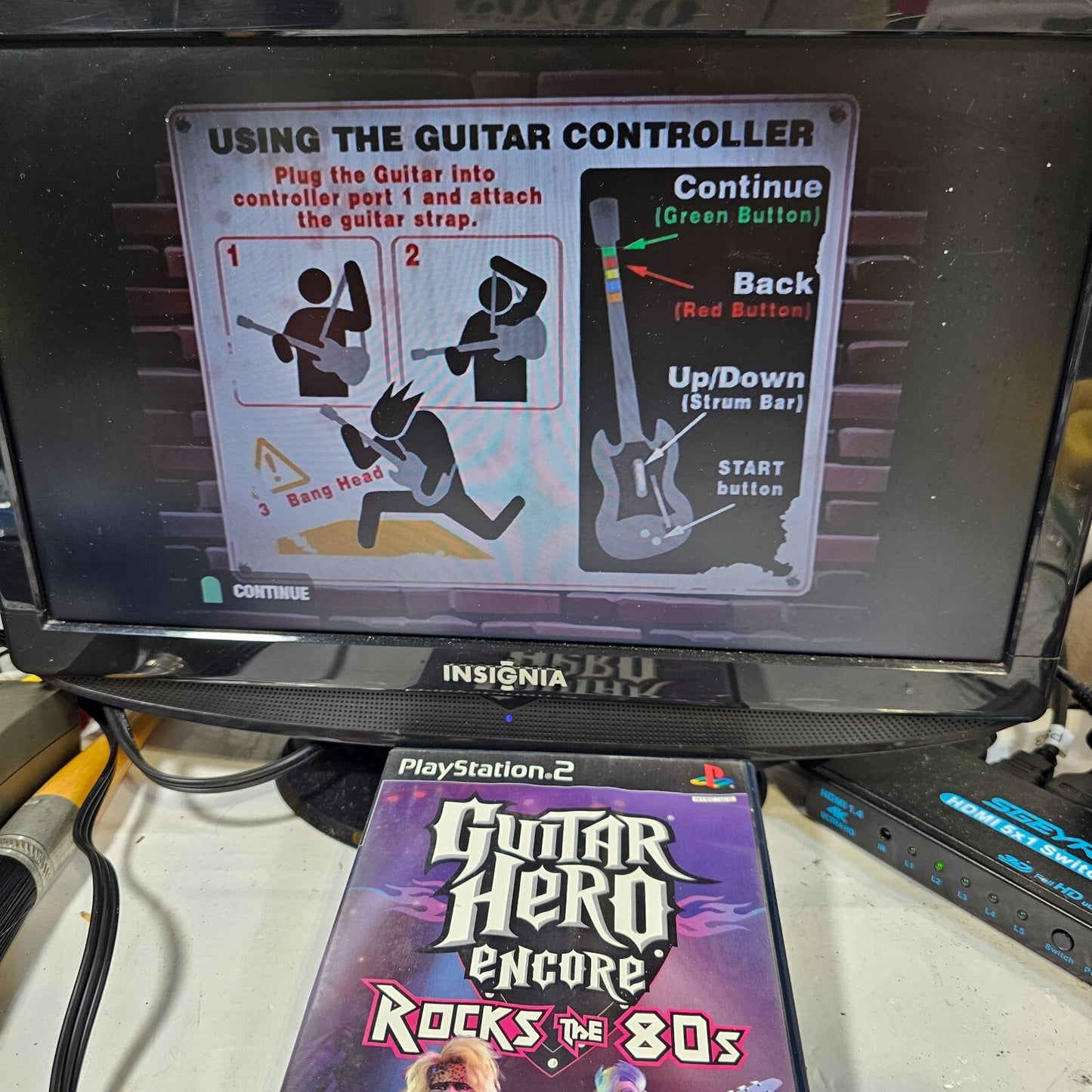 Guitar Hero Encore Rocks the 80's (Sony PlayStation 2, 2007) Case Game Manual