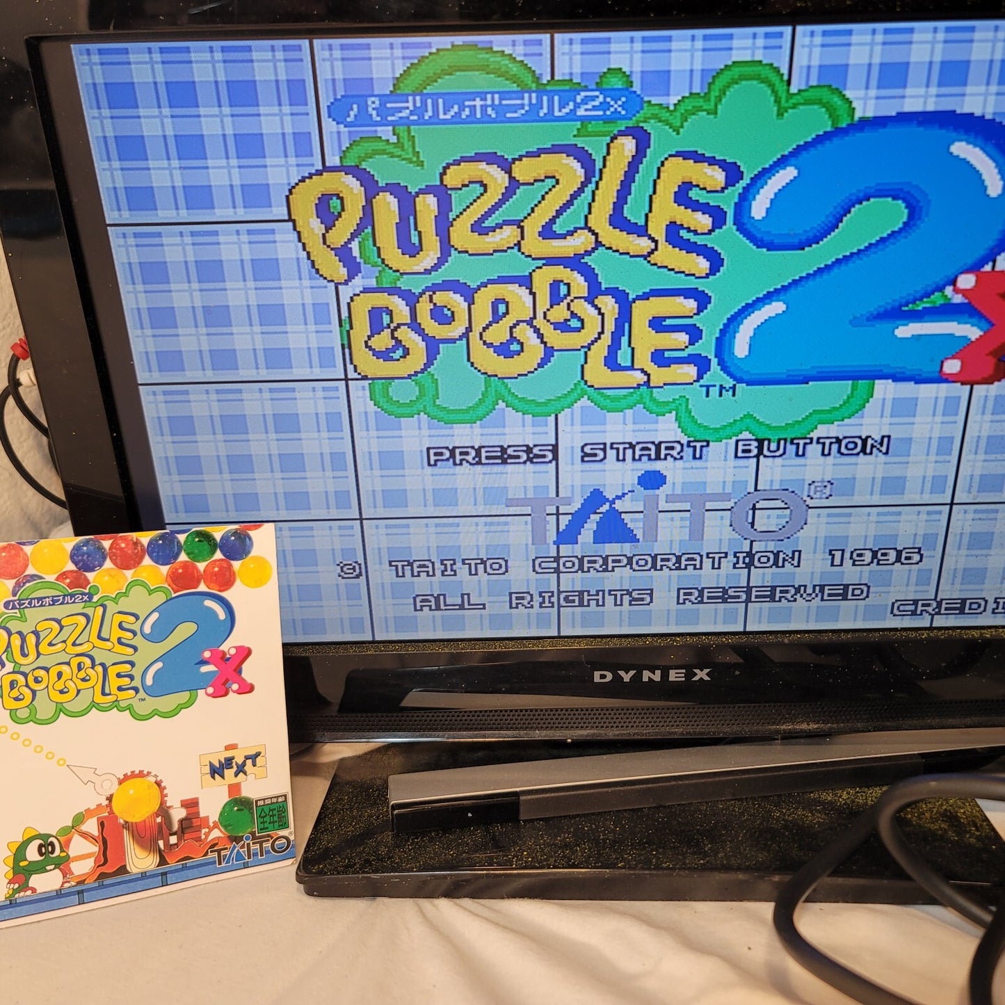 Puzzle Bobble 2X (JP Sega Saturn, 1996) Disc and Manual