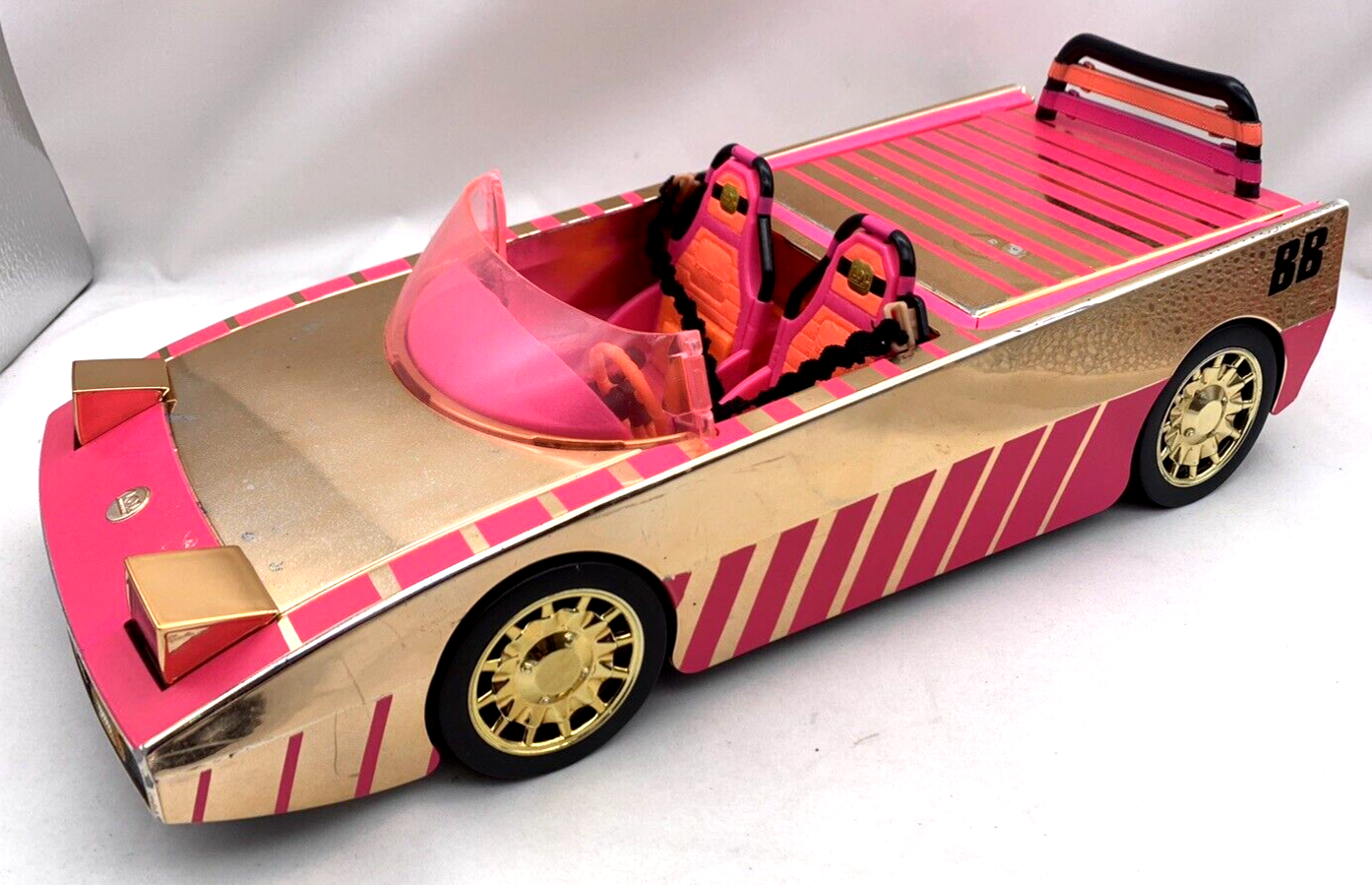 MGA 2019 L.O.L. Surprise Pink/Gold Speedmatic Car Pool Coupe - Lights Work