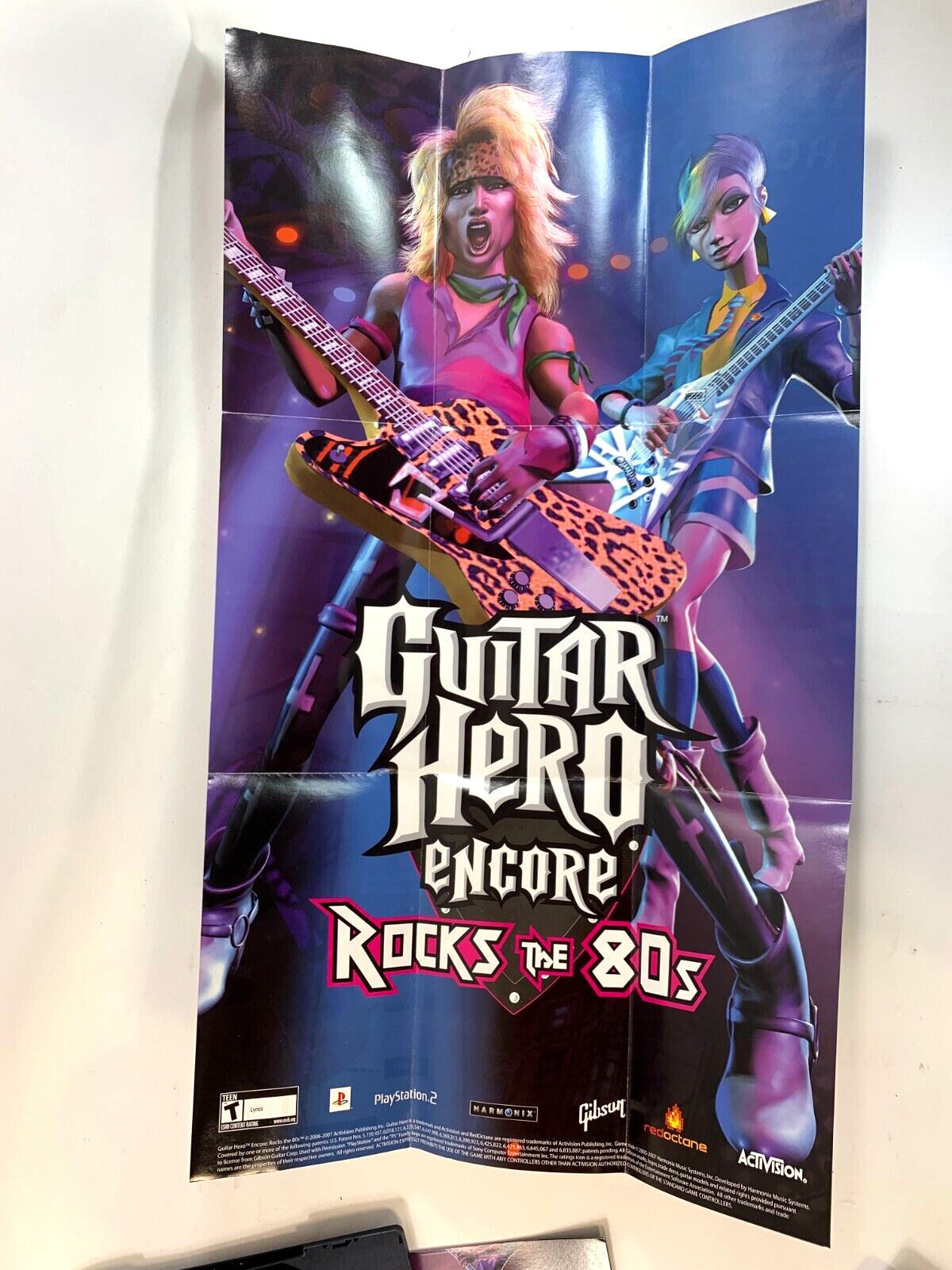 Guitar Hero Encore Rocks the 80s (PlayStation 2, 2007) Case Game Manual Poster