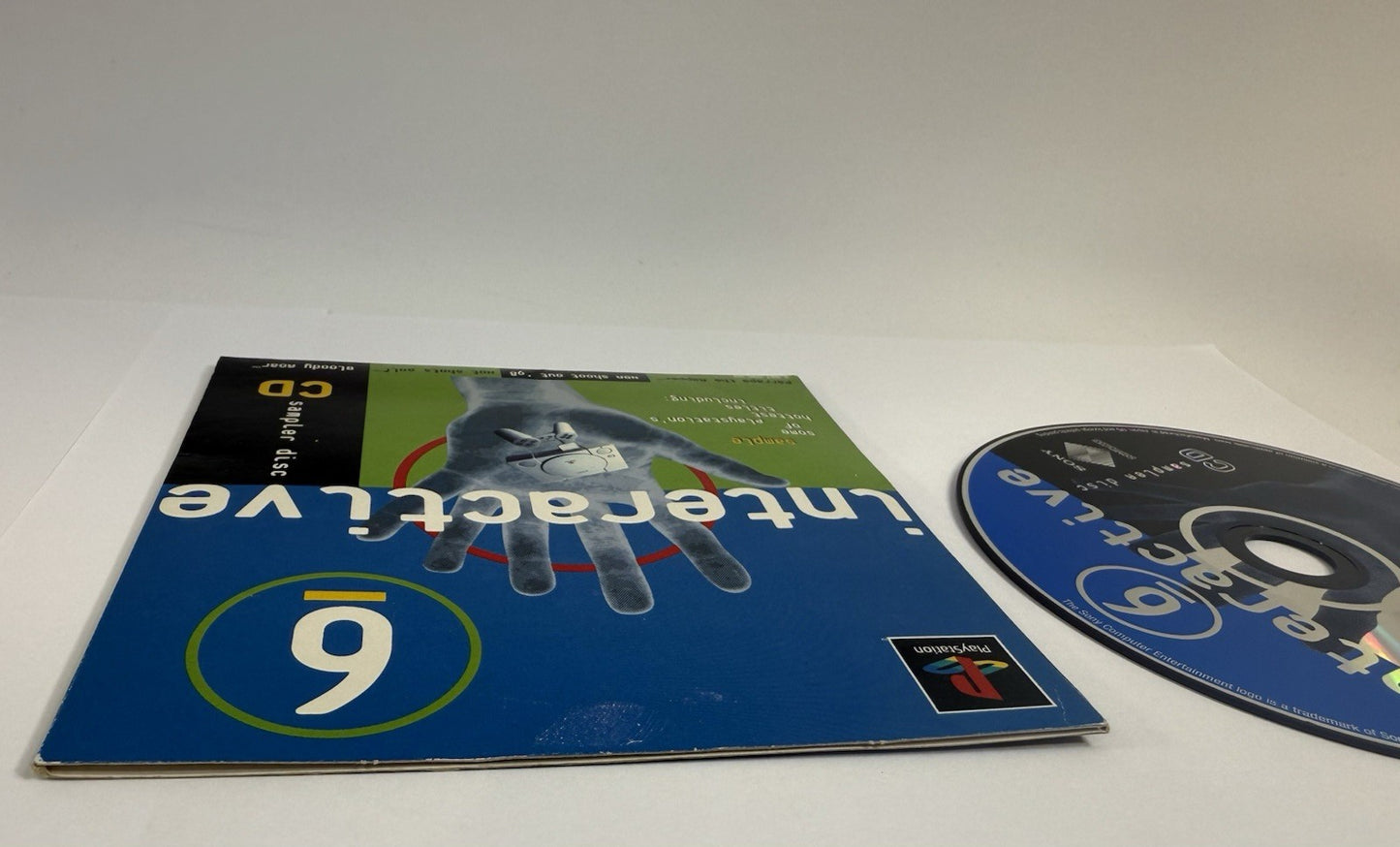Interactive CD Sampler Disc 6 (PlayStation 1, 1998) Disc and Sleeve - Tested