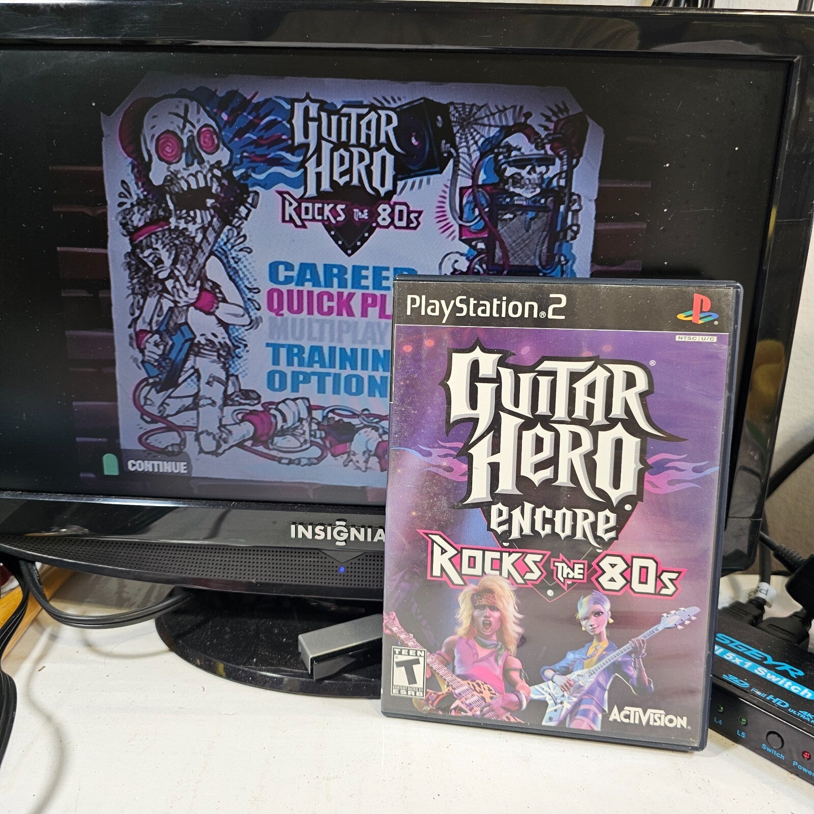 Guitar Hero Encore Rocks the 80's (Sony PlayStation 2, 2007) Case Game Manual