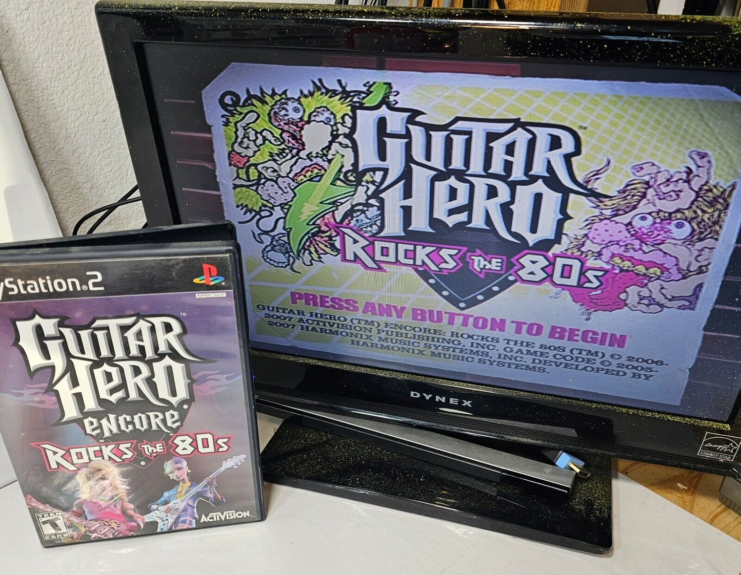 Guitar Hero Encore Rocks the 80's (Sony PlayStation 2, 2007) Case Game Manual