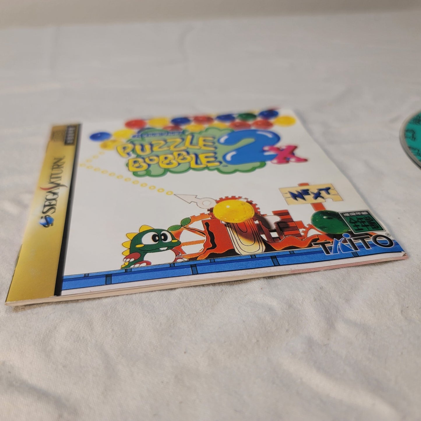 Puzzle Bobble 2X (JP Sega Saturn, 1996) Disc and Manual
