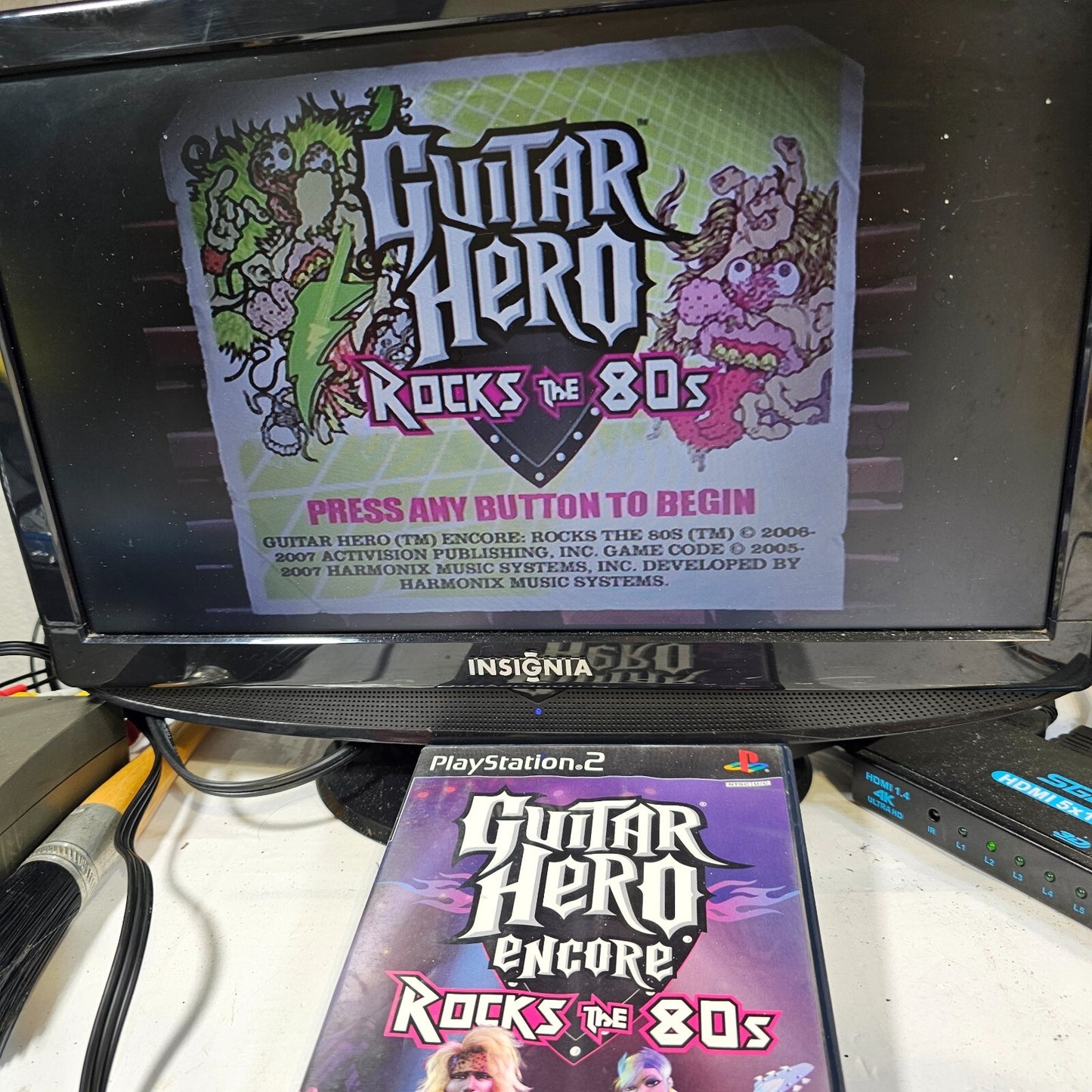 Guitar Hero Encore Rocks the 80's (Sony PlayStation 2, 2007) Case Game Manual