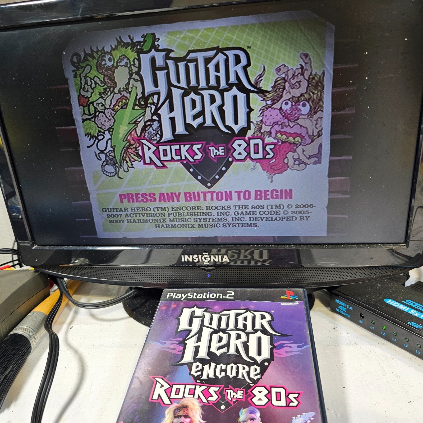 Guitar Hero Encore Rocks the 80's (Sony PlayStation 2, 2007) Case Game Manual