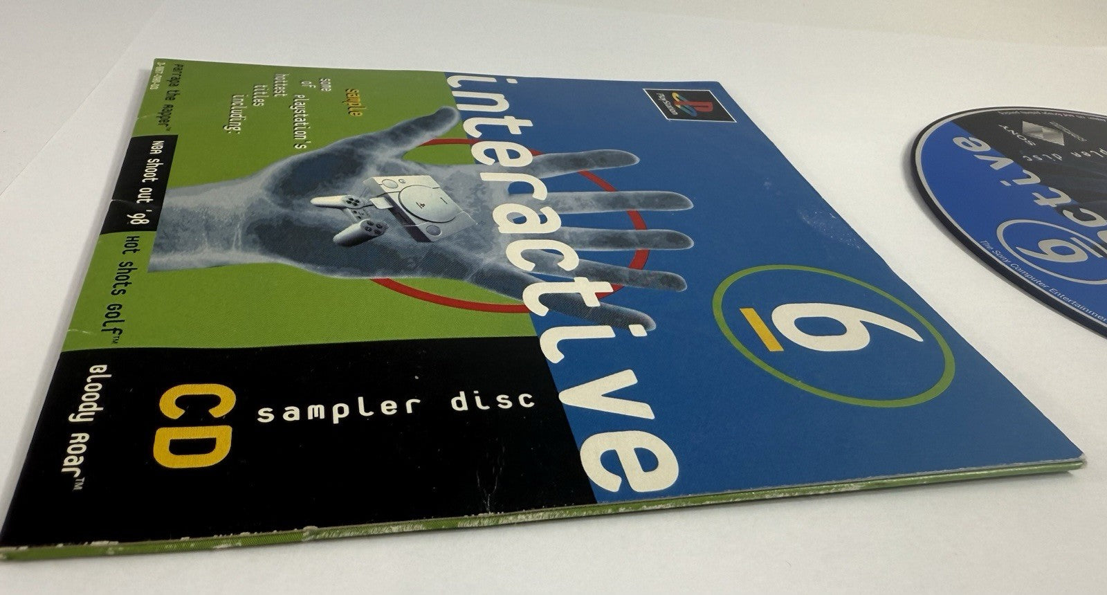 Interactive CD Sampler Disc 6 (PlayStation 1, 1998) Disc and Sleeve - Tested