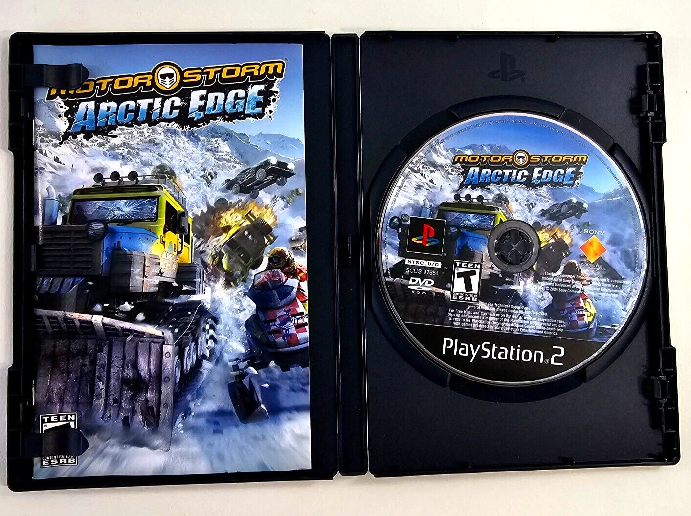 MotorStorm: Arctic Edge (Sony PlayStation 2, 2009) Game Case Manual - Tested
