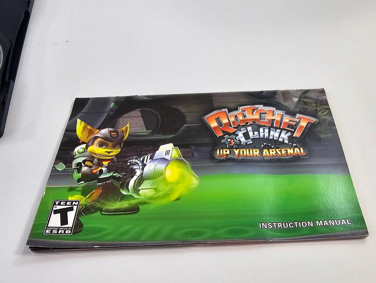 Ratchet & Clank: Up your Arsenal (PlayStation 2, 2004) Game Case Manual Insert