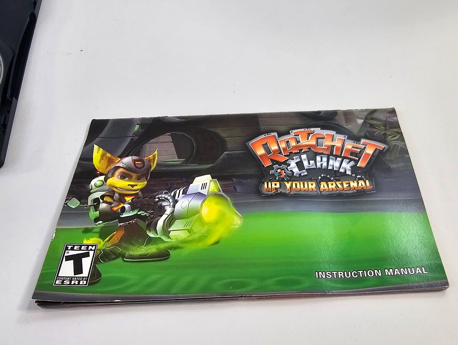 Ratchet & Clank: Up your Arsenal (PlayStation 2, 2004) Game Case Manual Insert