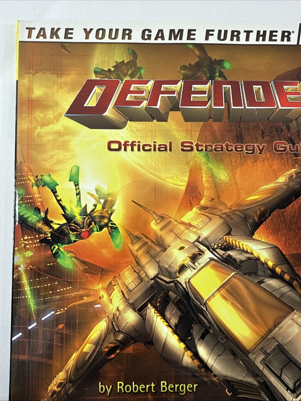 Defender Official Strategy Guide by Robert Berger (2002, BradyGames)