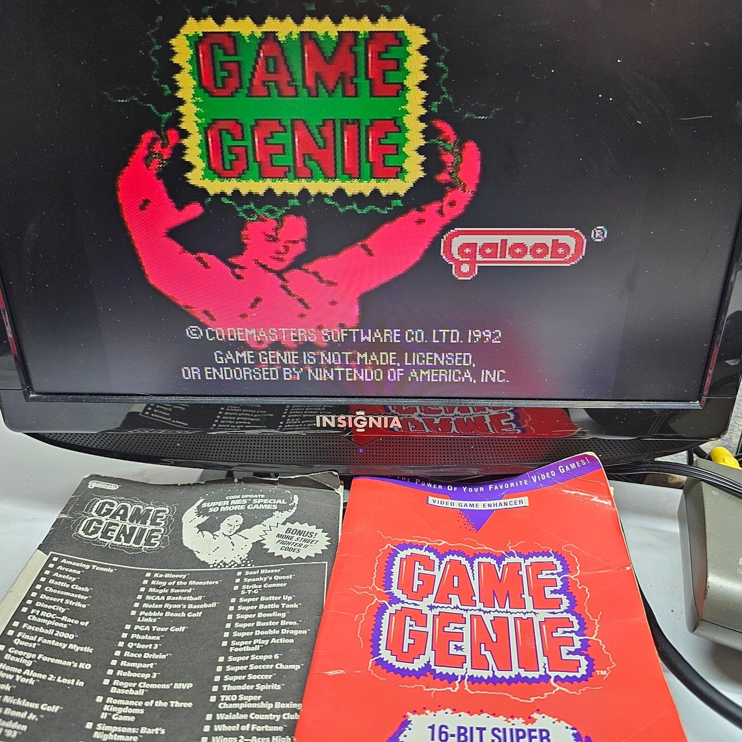 Galoob Game Genie Video Game Enhancer (Super Nintendo, 1992) with Code Books