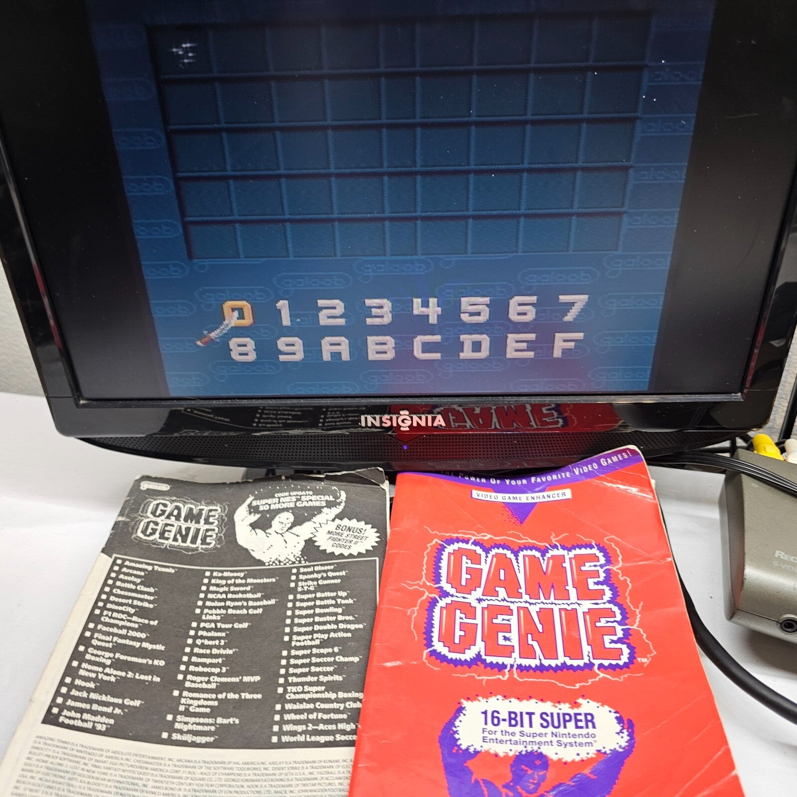 Galoob Game Genie Video Game Enhancer (Super Nintendo, 1992) with Code Books