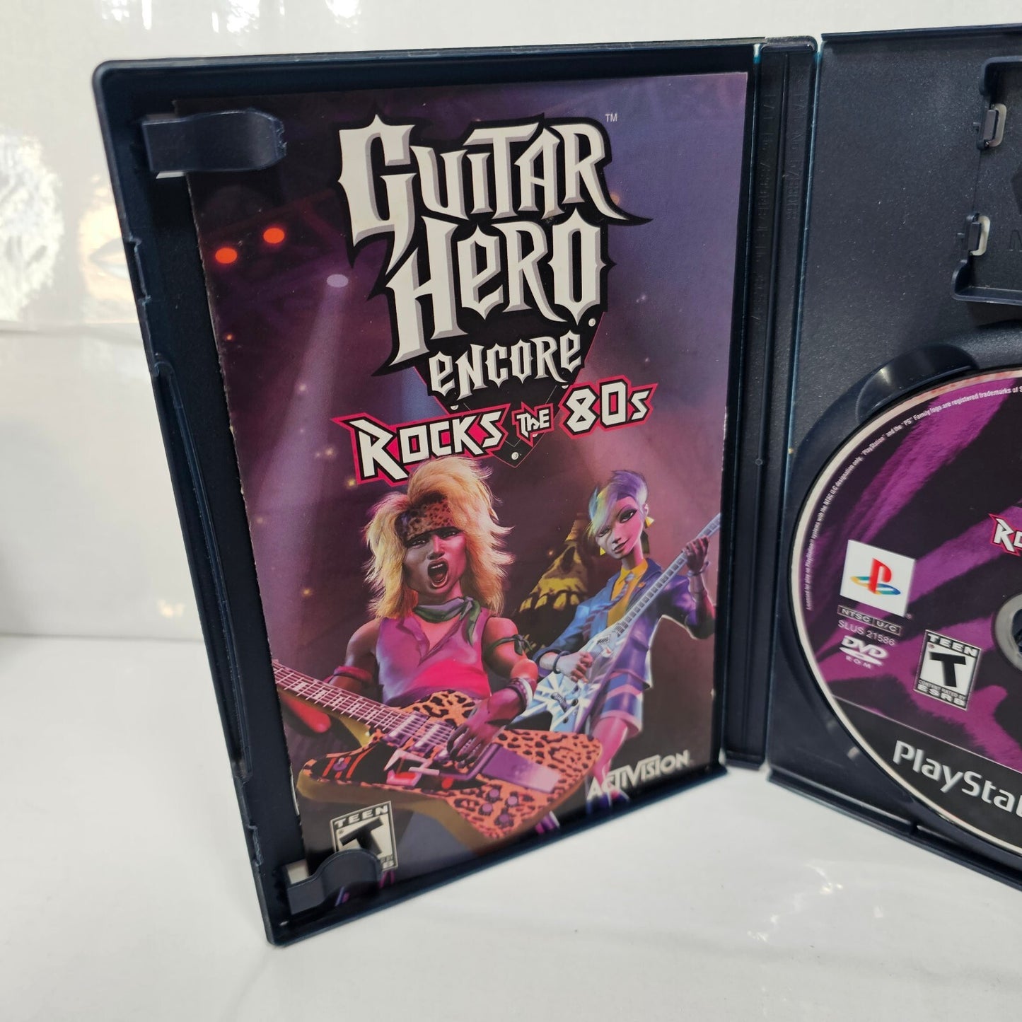 Guitar Hero Encore Rocks the 80's (Sony PlayStation 2, 2007) Case Game Manual