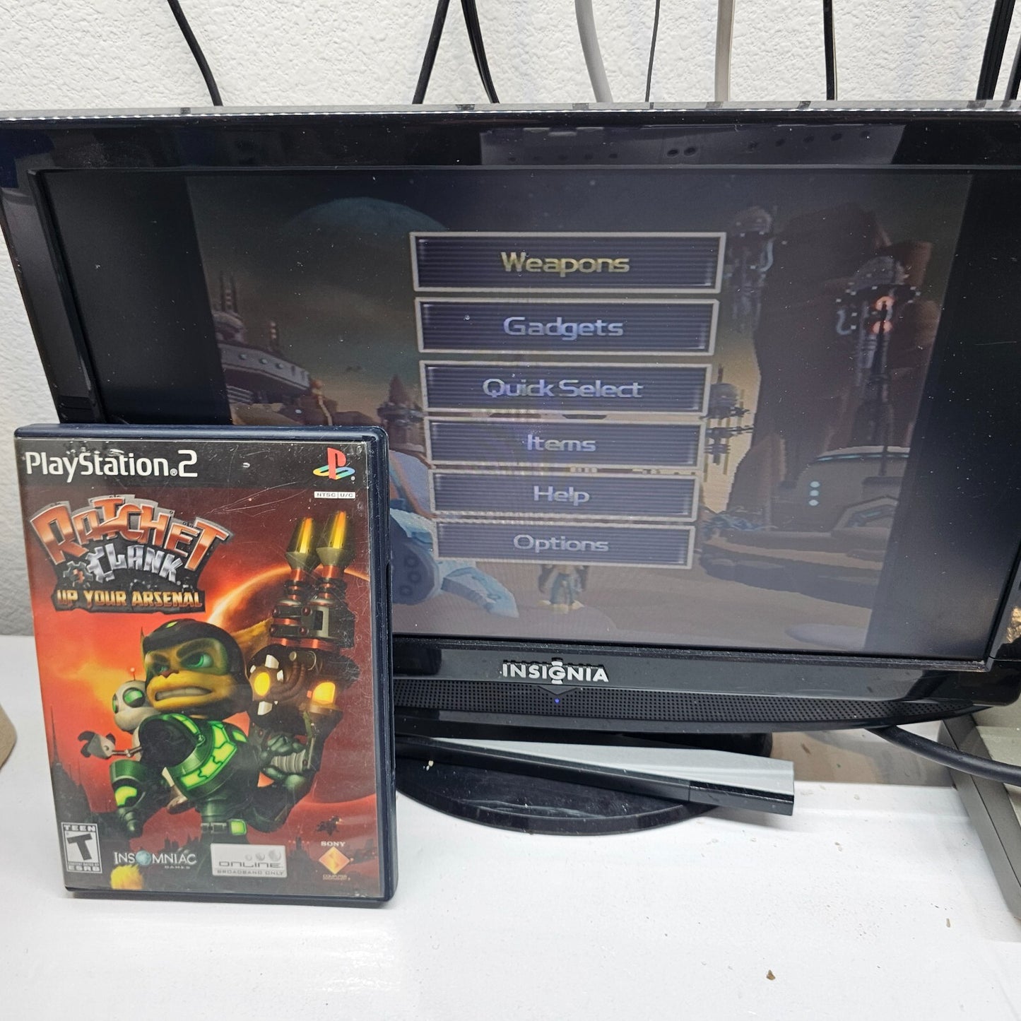 Ratchet & Clank: Up your Arsenal (PlayStation 2, 2004) Game Case Manual Insert