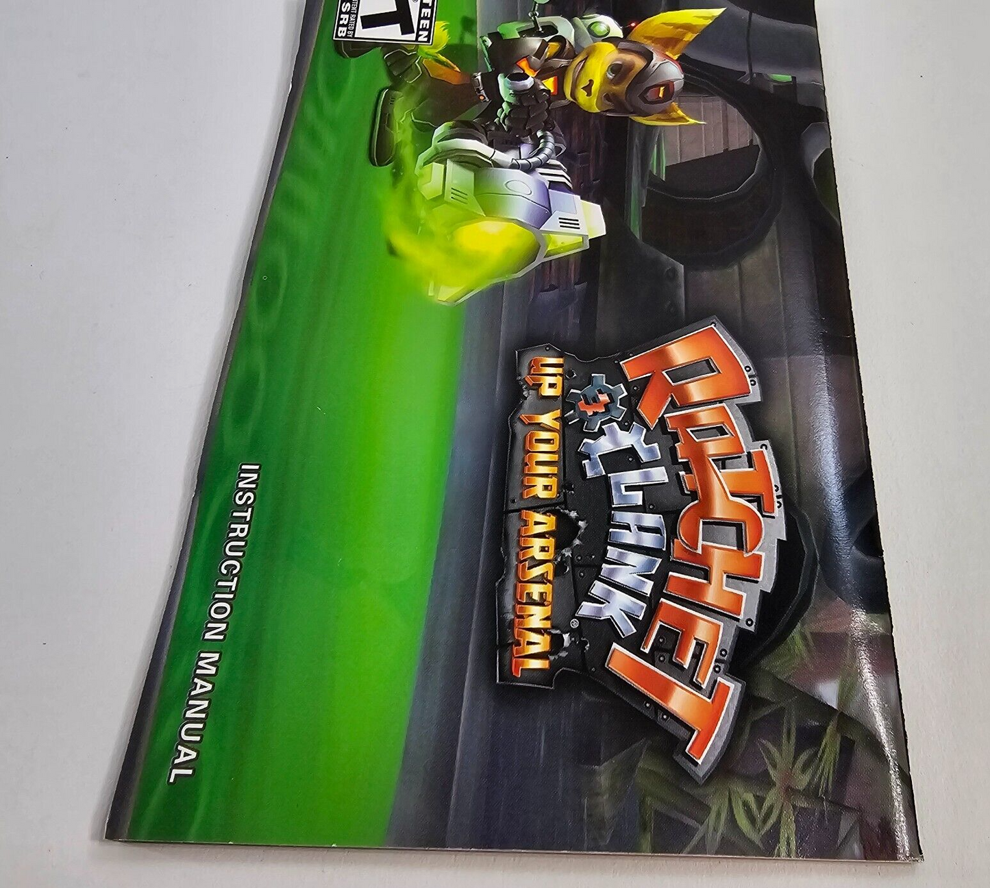 Ratchet & Clank: Up your Arsenal (PlayStation 2, 2004) Game Case Manual Insert
