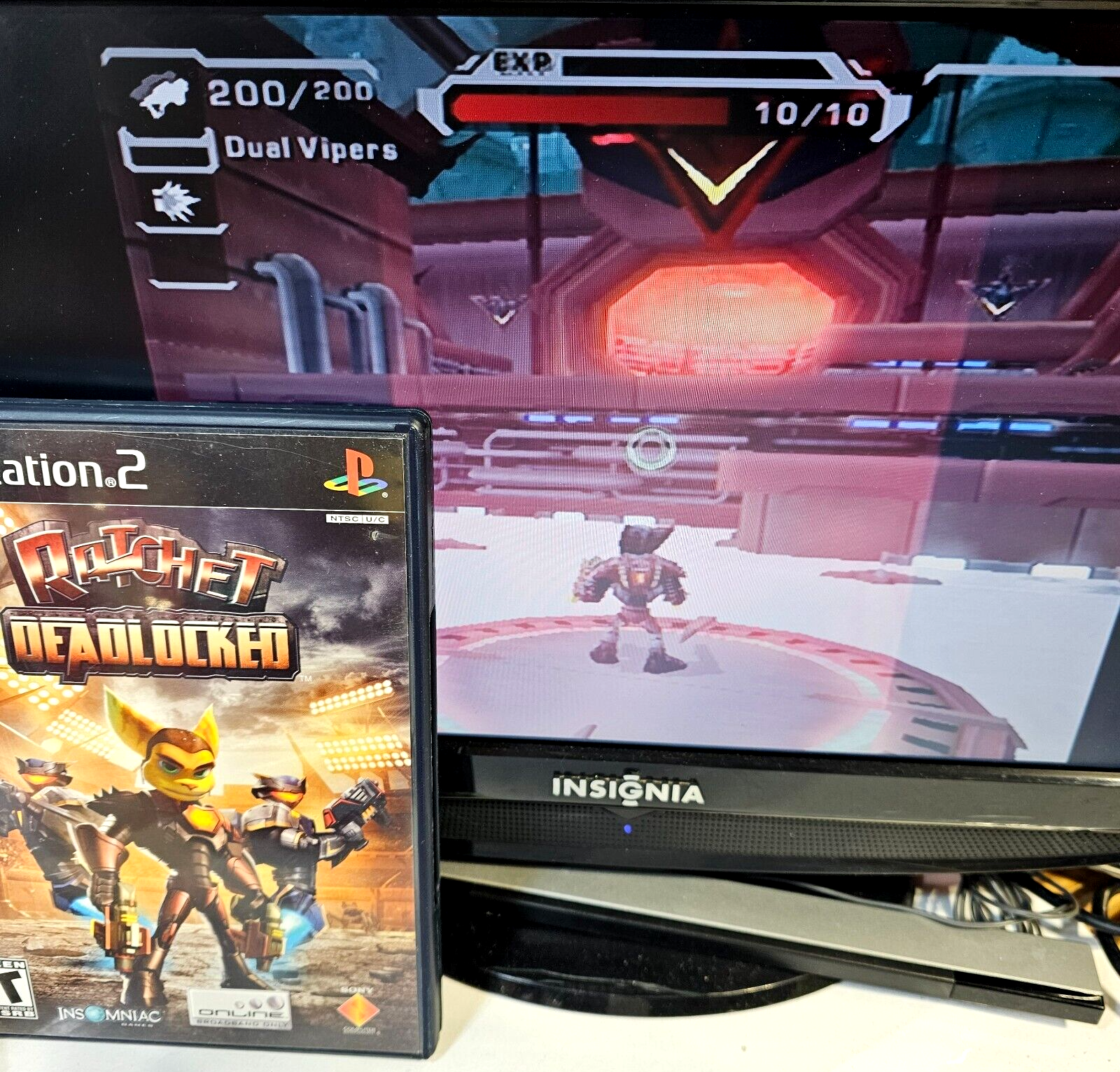 Ratchet: Deadlocked (Sony PlayStation 2, 2005) Game Case Manual - Tested